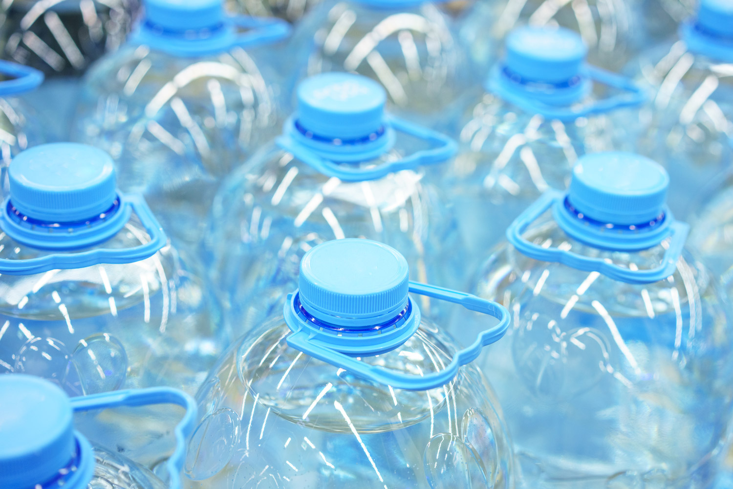 five-liter-plastic-drinking-water-bottles-close-up-soft-focus